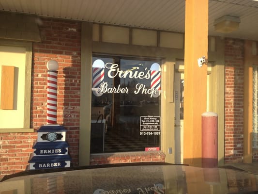 Interior of Ernie's Barber Shop showing vintage chairs on Santa Fe Street