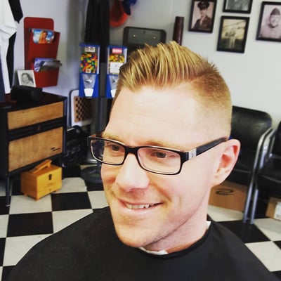 Classic men's haircut with tapered sides from Ernie's barber