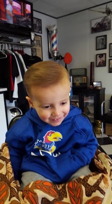 Close-up of a finished men's fade haircut at Ernie's Barber Shop in Olathe